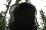 [Silhouetted Stephanie in anti-mosquito garb]