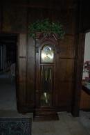 [Grandfather clock in the entryway]