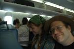 [Stephanie and Frank on a plane]