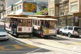 [Two cable cars passing each other in San Francisco]