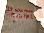 [Graffiti in cell: It was more fun in Hell]