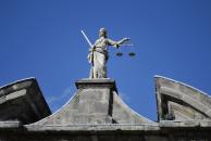 [Statue on top of building in Dublin Castle]