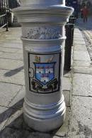 [Dublin city logo on column]