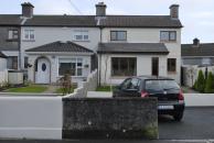 [Houses looking out on Galway Bay]