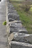 [Stone wall between Galway and Salthill looking east to Salthill]