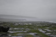 [Glacial erratic rock by the ocean]