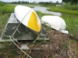 [Oarboat and canoes by the stream]