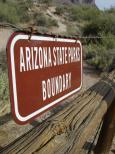 [Sign and fence]