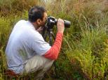 [Deepak photographing morning dew ]